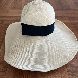 Elegant Cream straw beach Sun Hat with Black Band by Luxury Divas